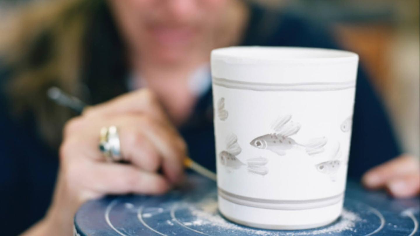 Miranda Thomas hand panting fish mugs