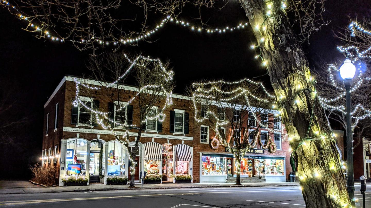 Elm Street shops in holiday lights